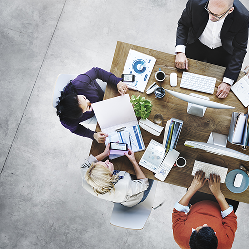 Group Working Around A Table