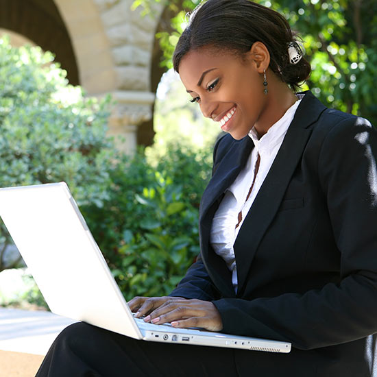 Woman Working On Laptop